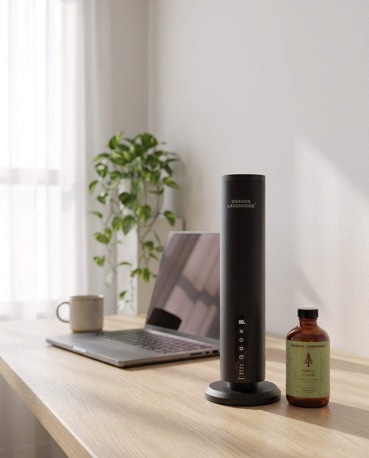 Grande Lavendera Smart App Waterless Aroma Diffuser with 4 oz Forest Floor (inspired by Baccarat Rouge 540) diffuser oil on a home office desk