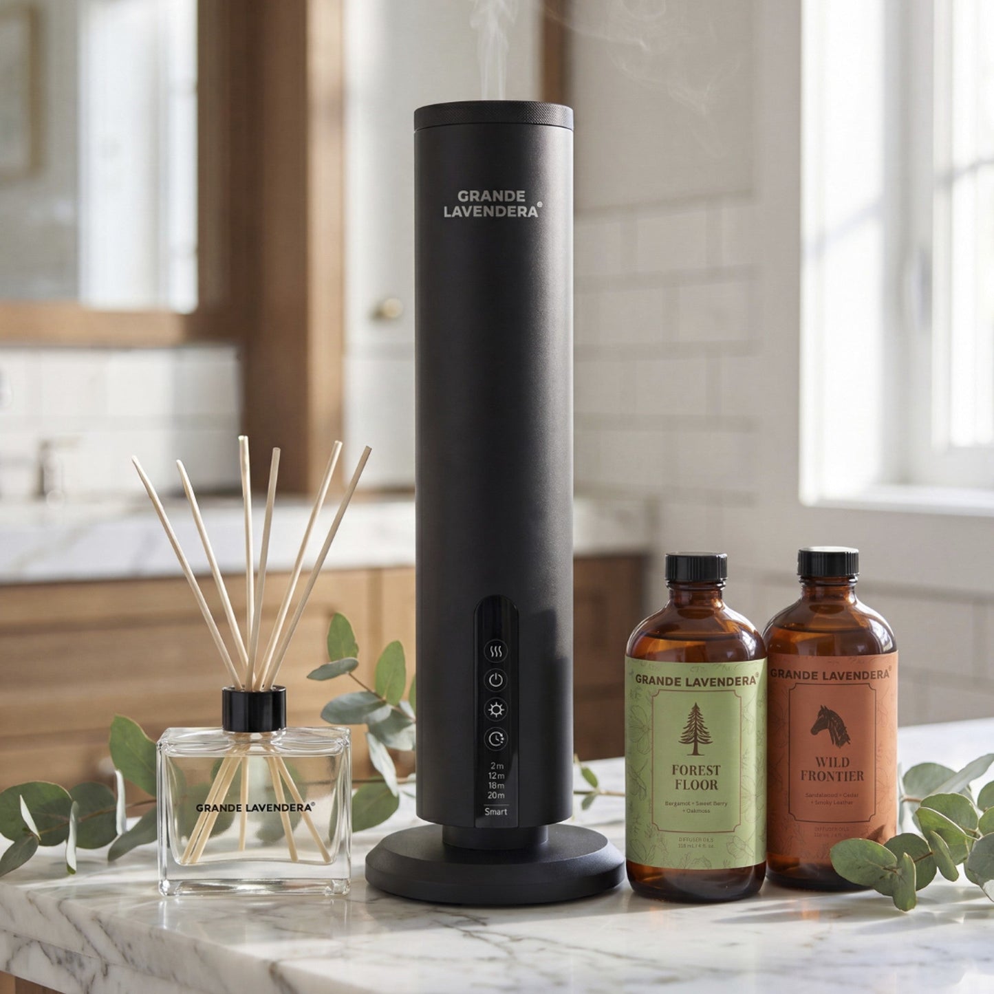 Grande Lavendera Ultimate Diffuser Bundle - smart waterless diffuser, reed diffuser, and Forest Floor and Wild Frontier diffuser oils on a marble counter
